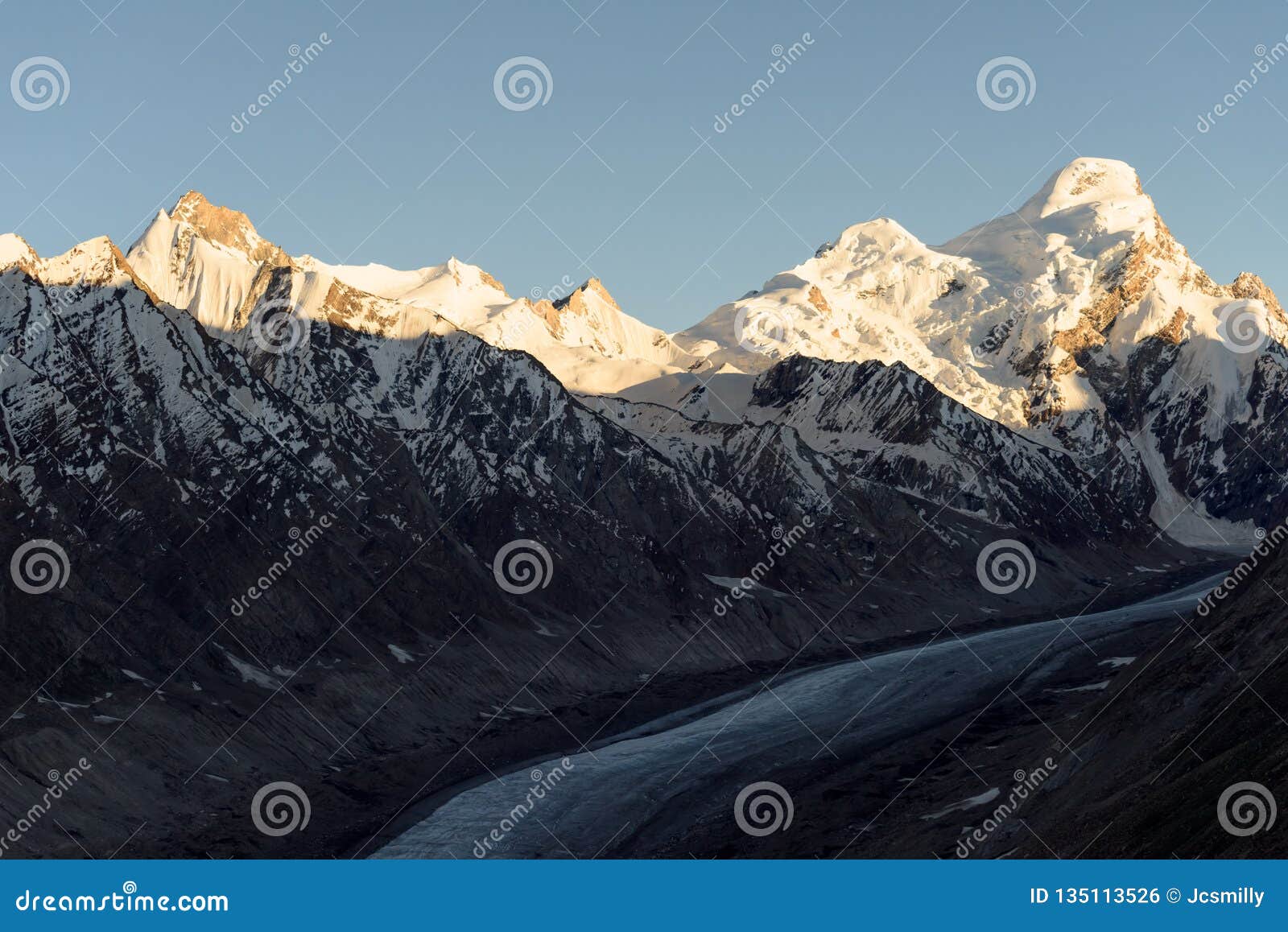 sunset at drang-drung glacier with a maximum length of 23 kilometres at an average elevation of 4,780ÃÂ m (15,680 feet)in the